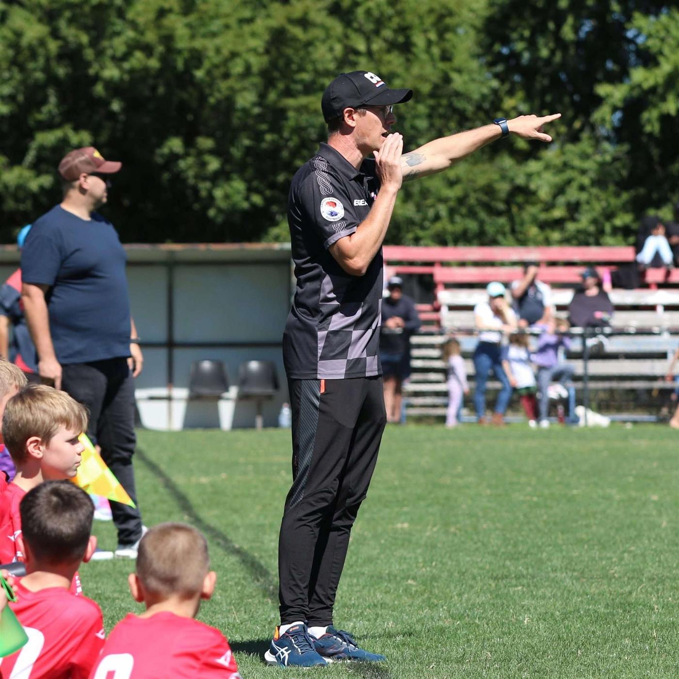 Head coach Danny Krajacic directing play from the sideline